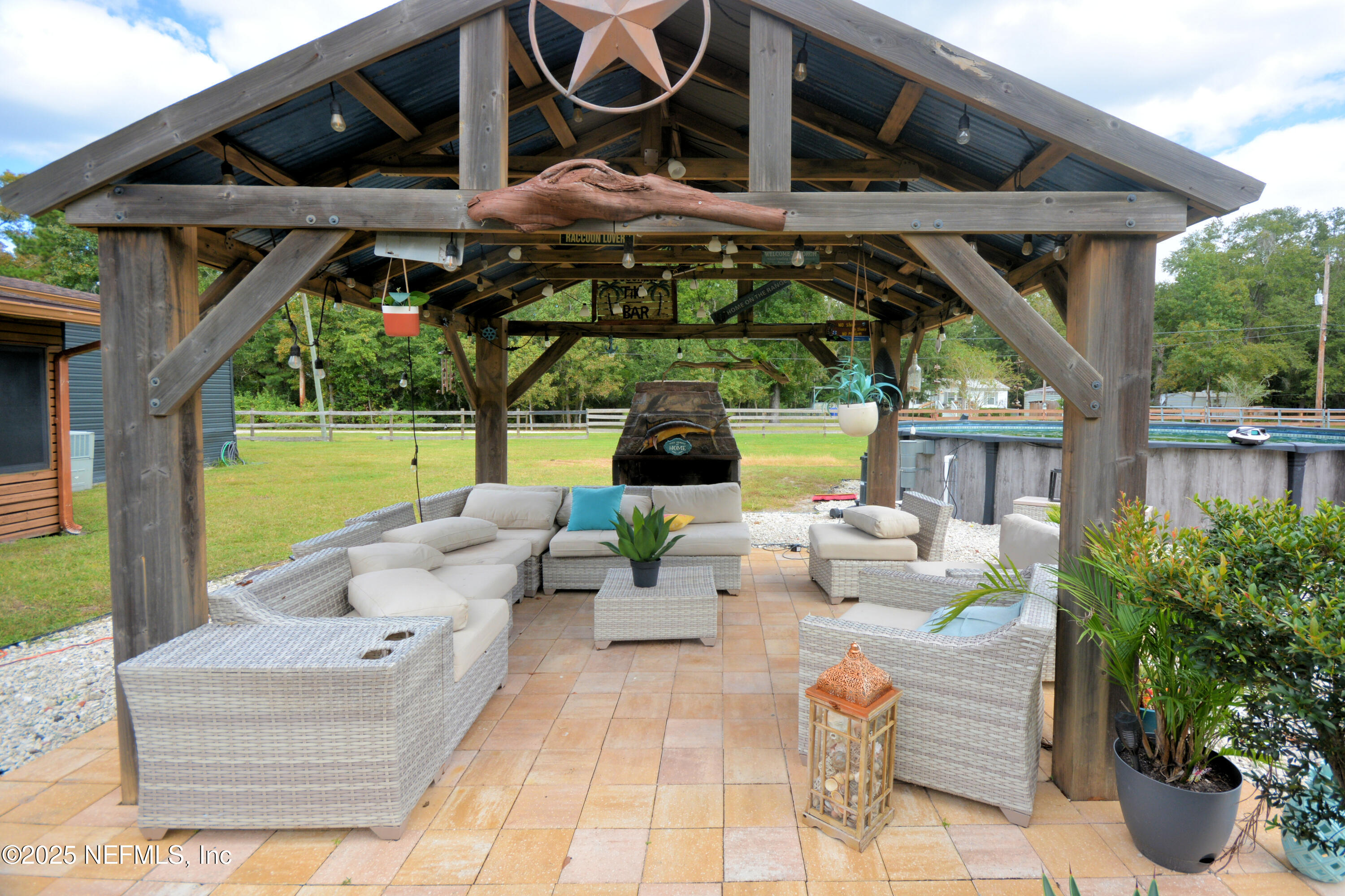 2241 Marlee Road South Jacksonville, FL 32259 - Photo 37 of 61 a view of a patio with couches and potted plants