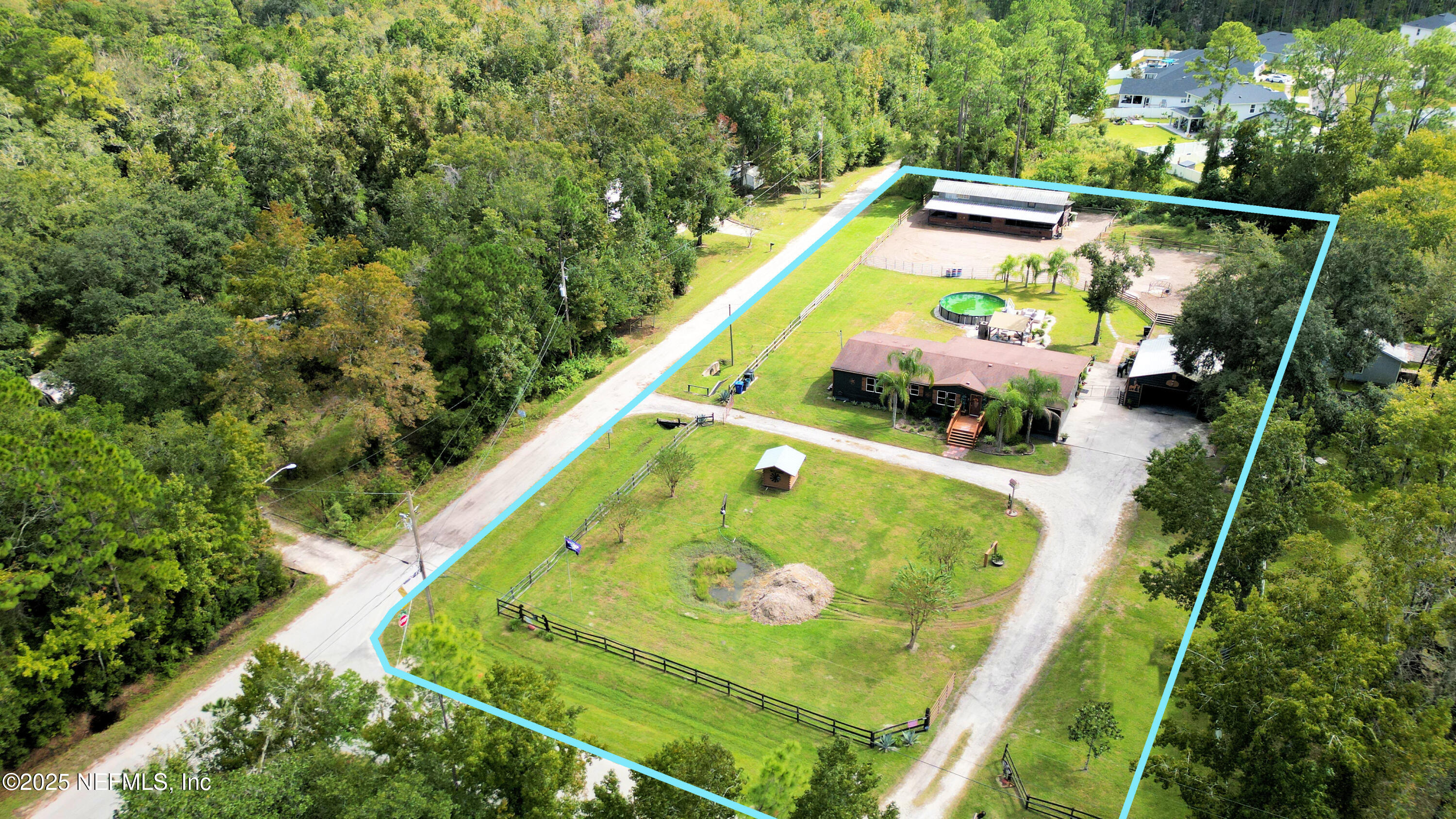 2241 Marlee Road South Jacksonville, FL 32259 - Photo 59 of 61 a view of swimming pool with a garden and seating area