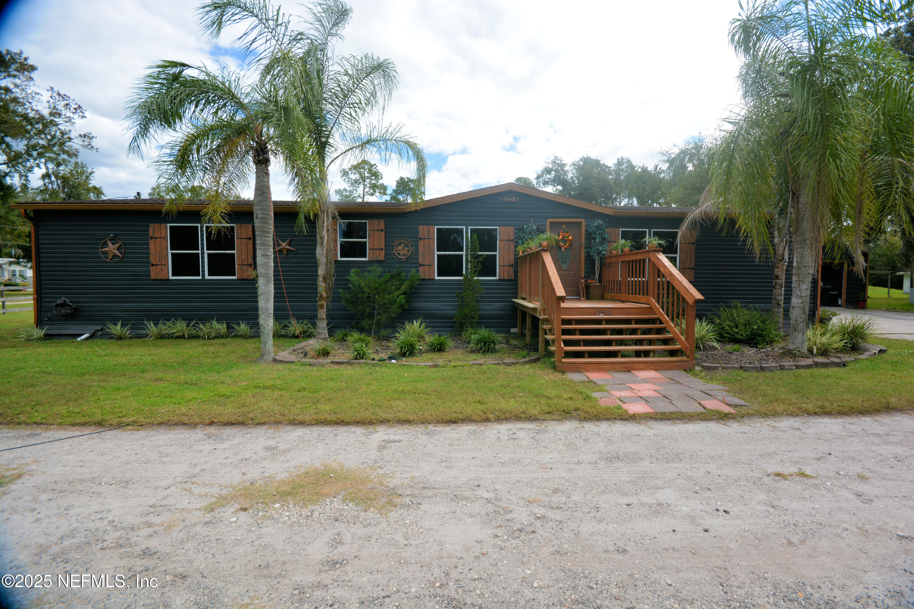 2241 Marlee Road South Jacksonville, FL 32259 - Photo 9 of 61 a front view of house with yard and green space