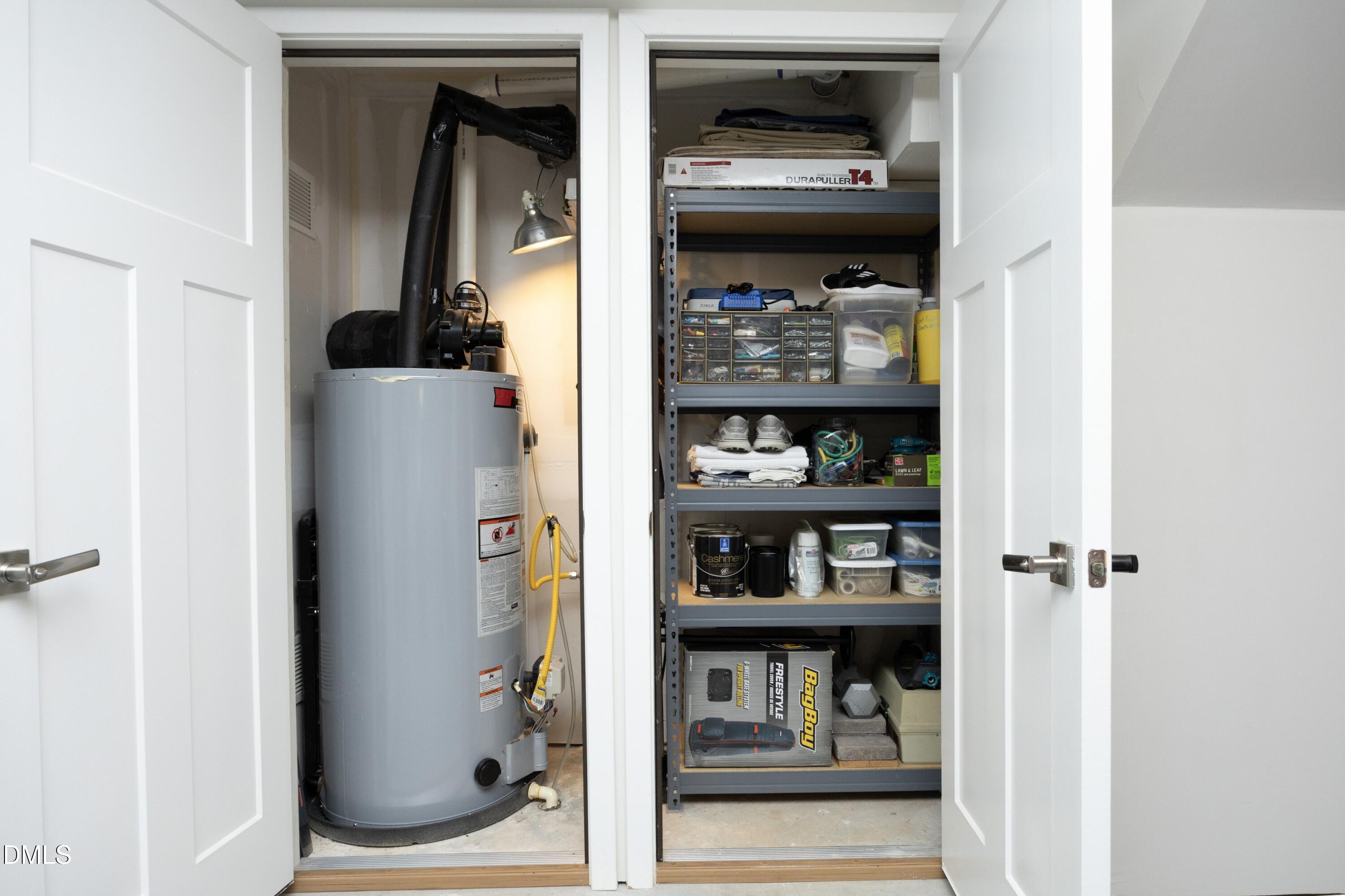 1091 Branch Line Lane Apex, NC 27502 - Photo 32 of 44 1091 branchline water heater closet phot