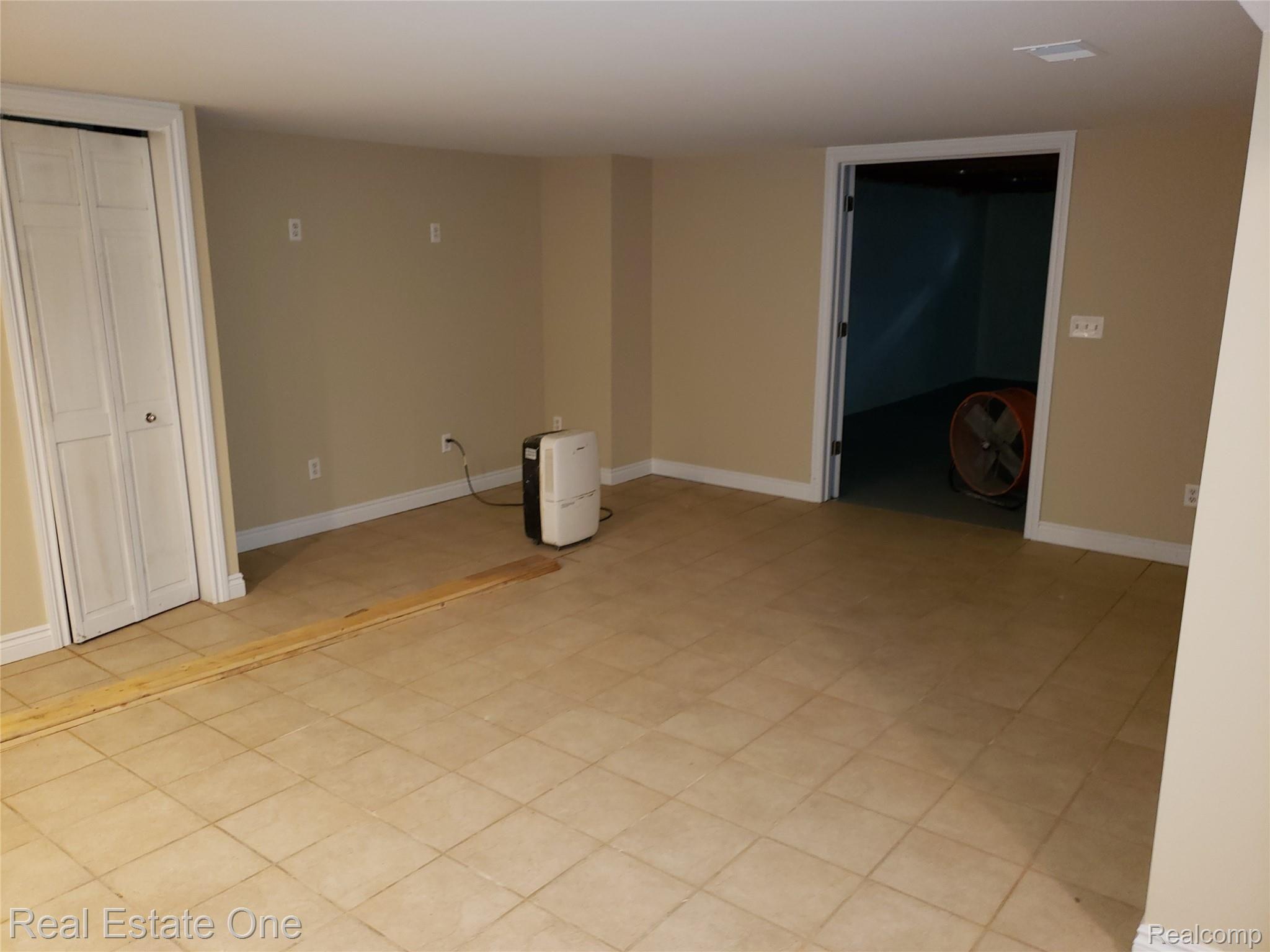 5621 Livernois Road Troy, MI 48098 - Photo 15 of 15 Partially Finished Basement w/Fireplace