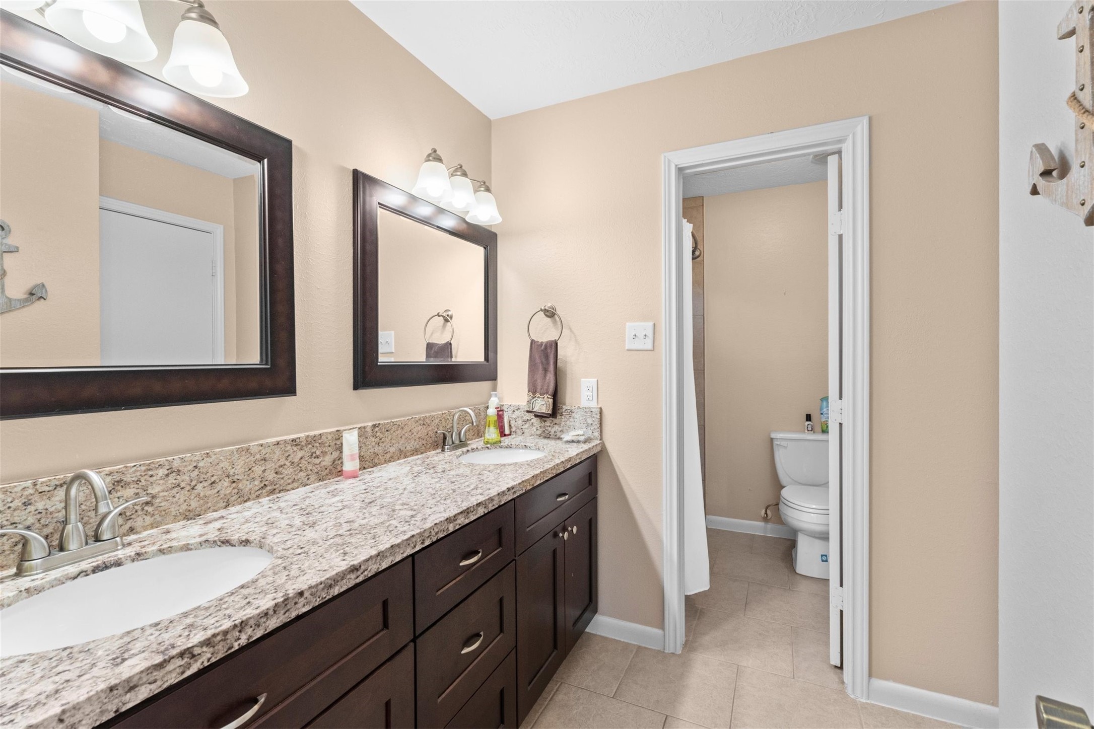 3826 Shipman Lane Spring, TX 77388 - Photo 33 of 43 Updated Jack-n-Jill bathroom shared by the two secondary bedrooms