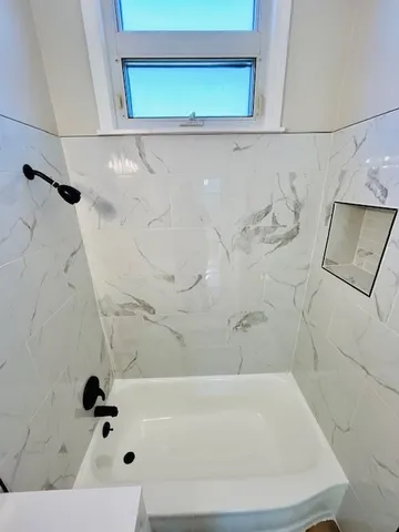 a bathroom with a bathtub