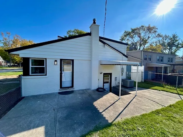 a house view with a backyard space