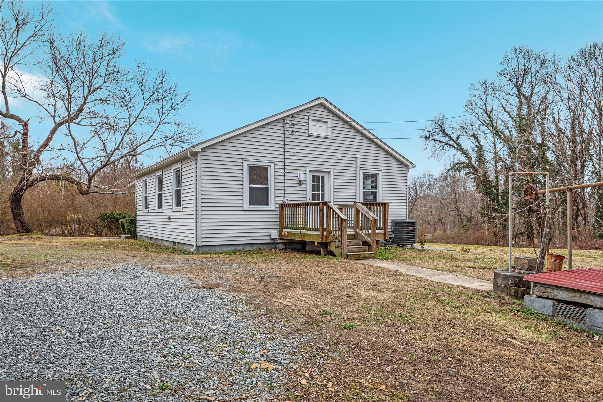 6533 Caledon Road King George, VA 22485 - Photo 28 of 32 a view of a house with a yard and a large tree