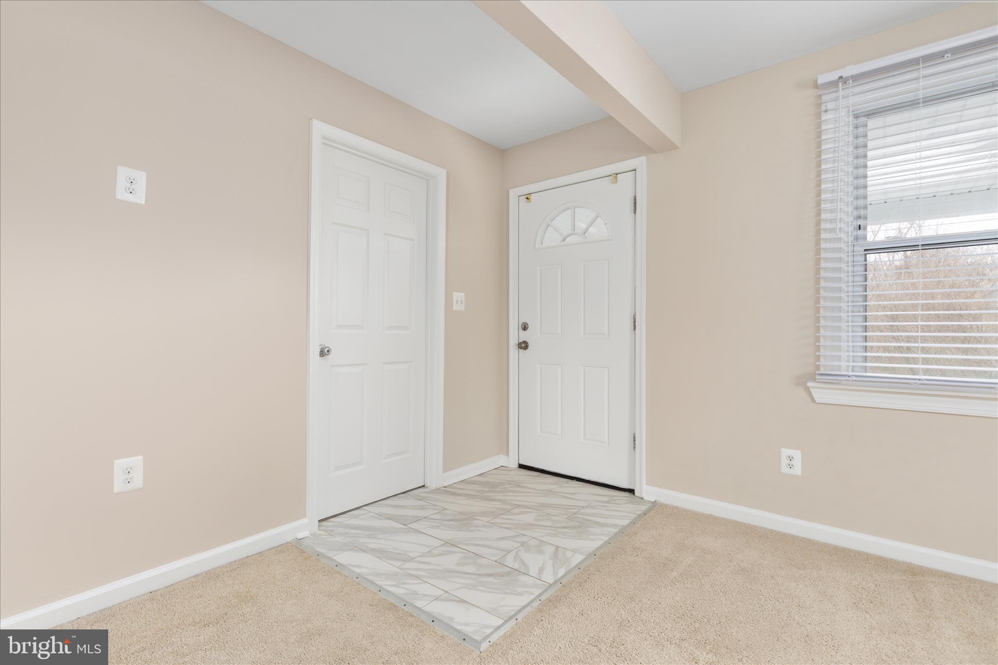 6533 Caledon Road King George, VA 22485 - Photo 3 of 32 an empty room with windows