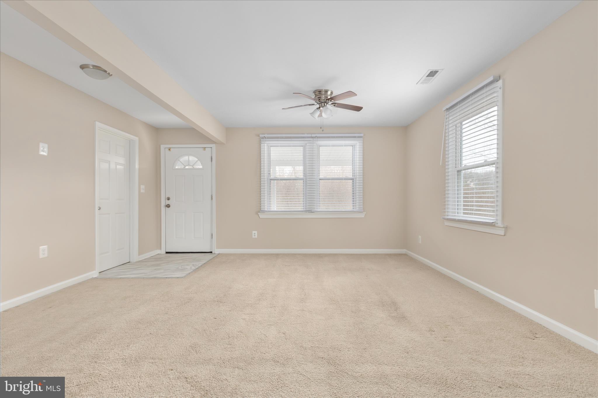 6533 Caledon Road King George, VA 22485 - Photo 4 of 32 a view of an empty room with a window