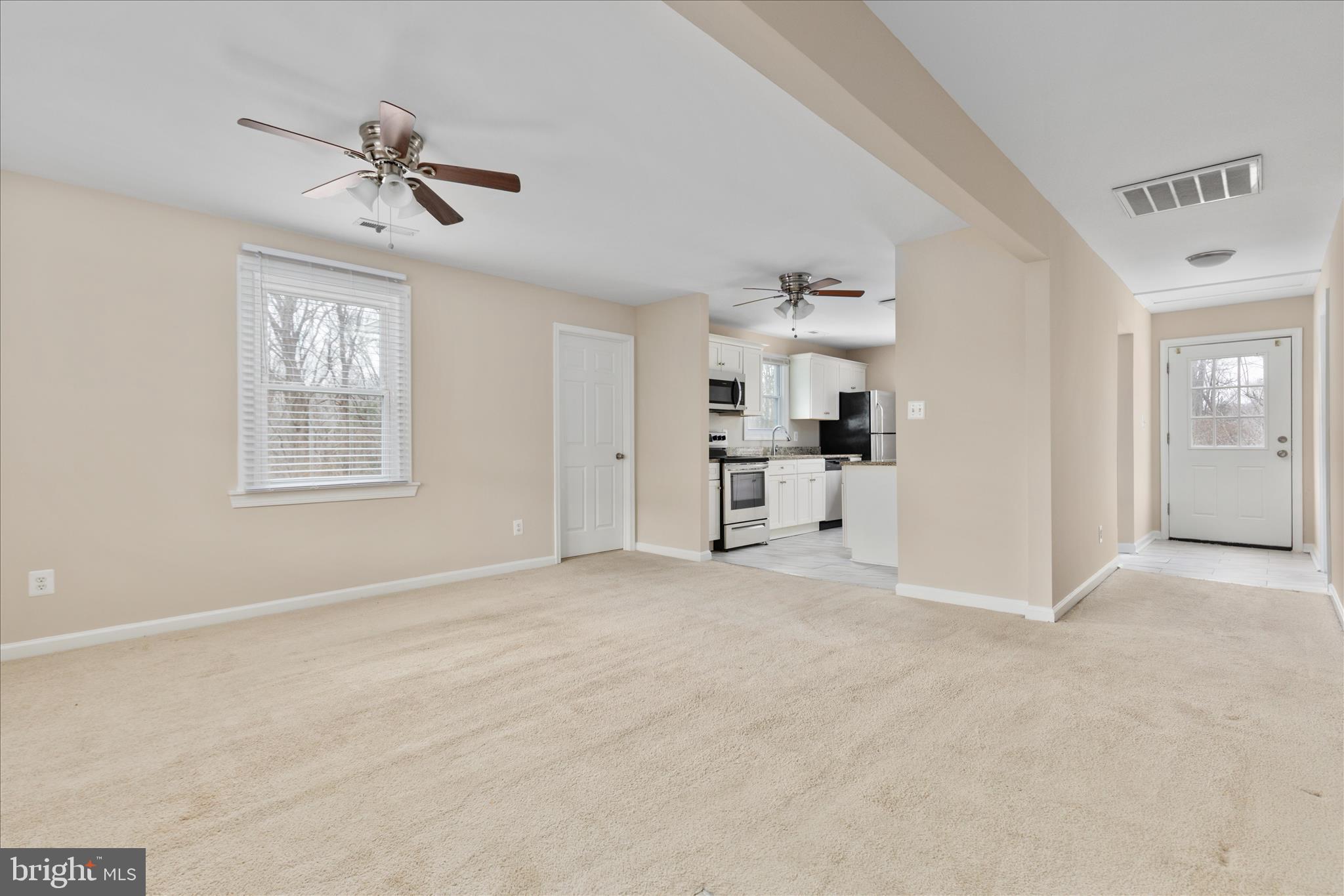 6533 Caledon Road King George, VA 22485 - Photo 7 of 32 a view of empty room with windows