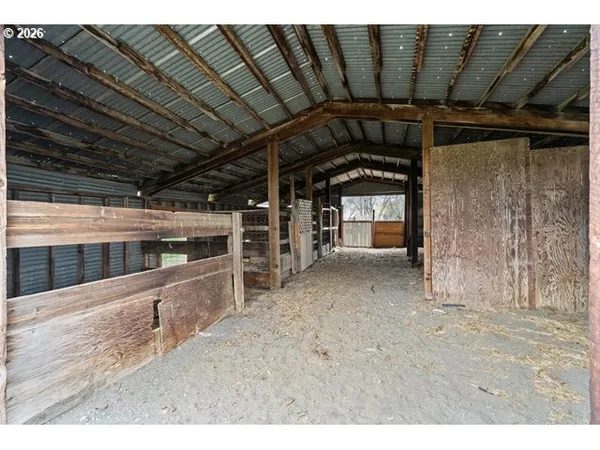 a view of a room with wooden walls