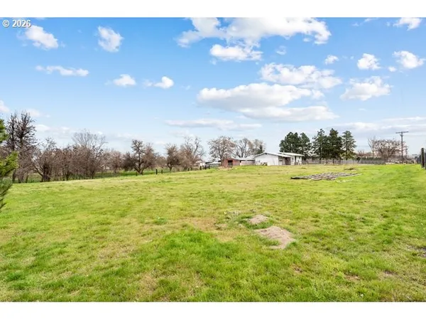 a view of a lake with a big yard