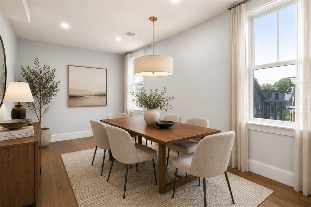 32 Pearl Street, Unit 4 Boston, MA 02125 - Photo 31 of 35 a view of a dining room with furniture window and wooden floor