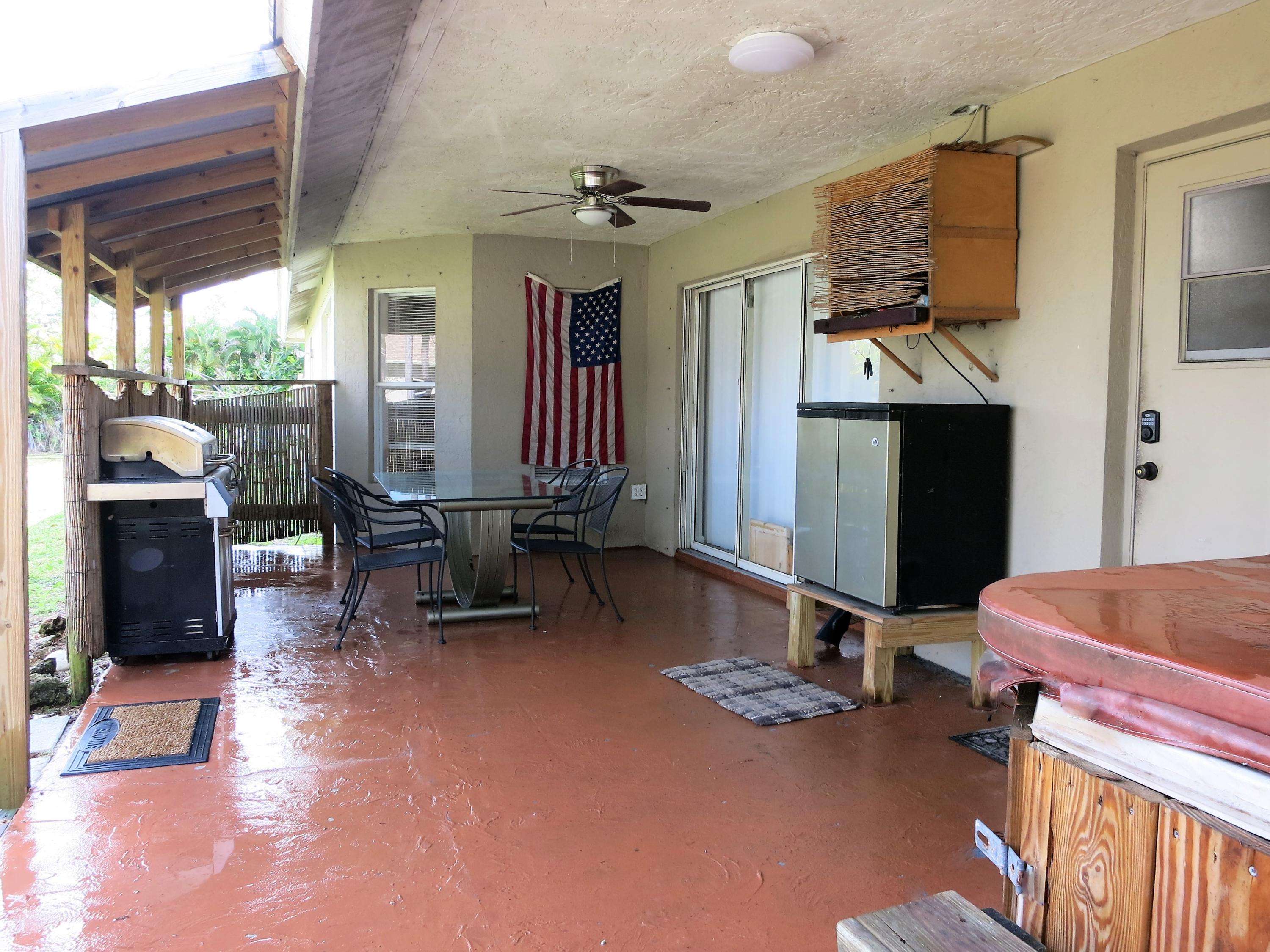 17977 78th Road North Loxahatchee, FL 33470 - Photo 22 of 37 Patio updated w/new ceiling fan