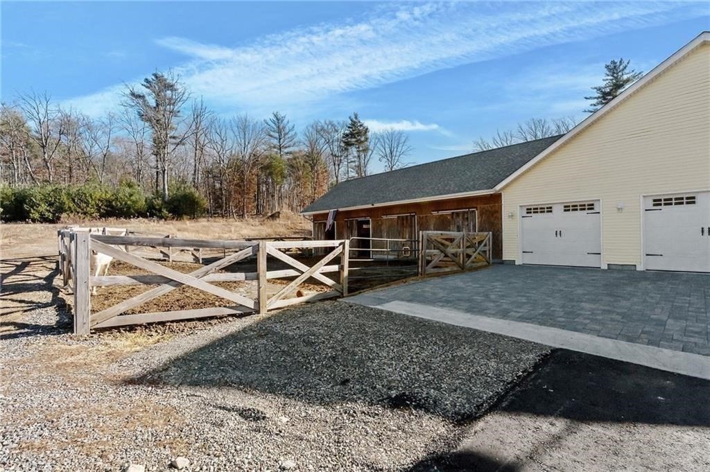 117 New Road Thompson, CT 06277 - Photo 27 of 29 a view of a house with a yard