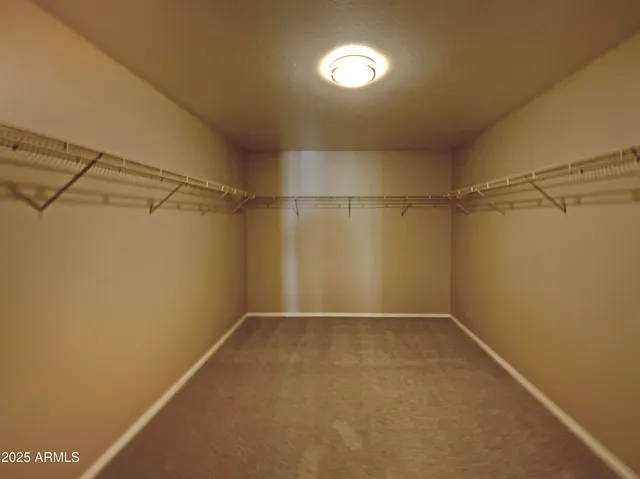 a view of a room with racks on the wall