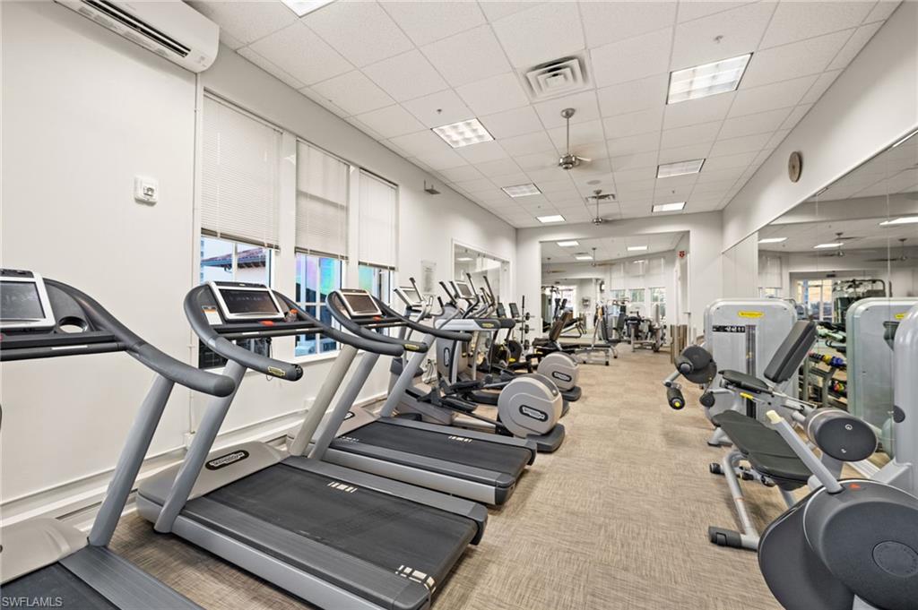 445 Dockside Drive, Unit A504 Naples, FL 34110 - Photo 47 of 50 a view of a room with gym equipment