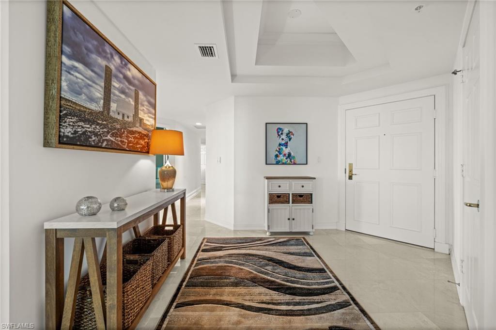 445 Dockside Drive, Unit A504 Naples, FL 34110 - Photo 8 of 50 a view of a livingroom with furniture