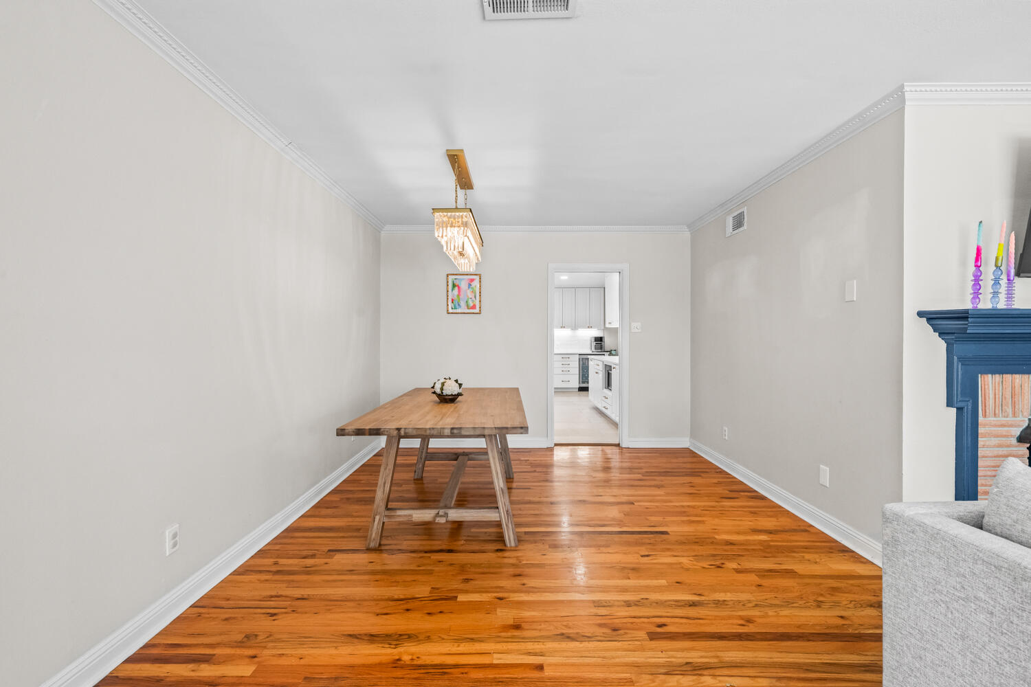 3310 24th Street Lubbock, TX 79410 - Photo 11 of 65 a room with wooden floor and table