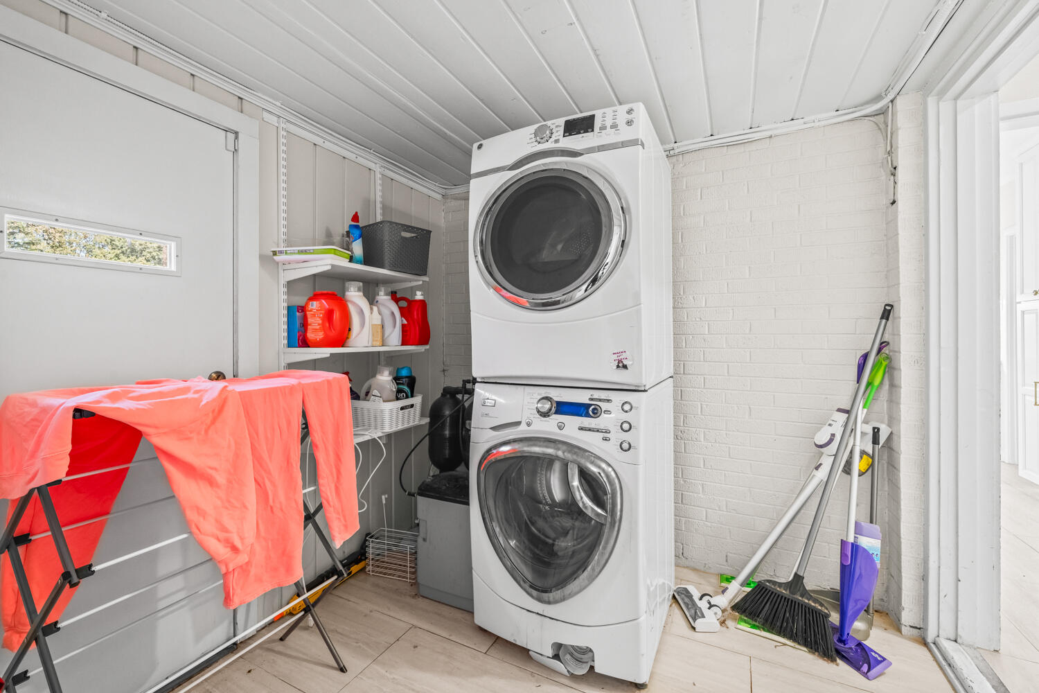 3310 24th Street Lubbock, TX 79410 - Photo 26 of 65 a utility room with dryer and washer