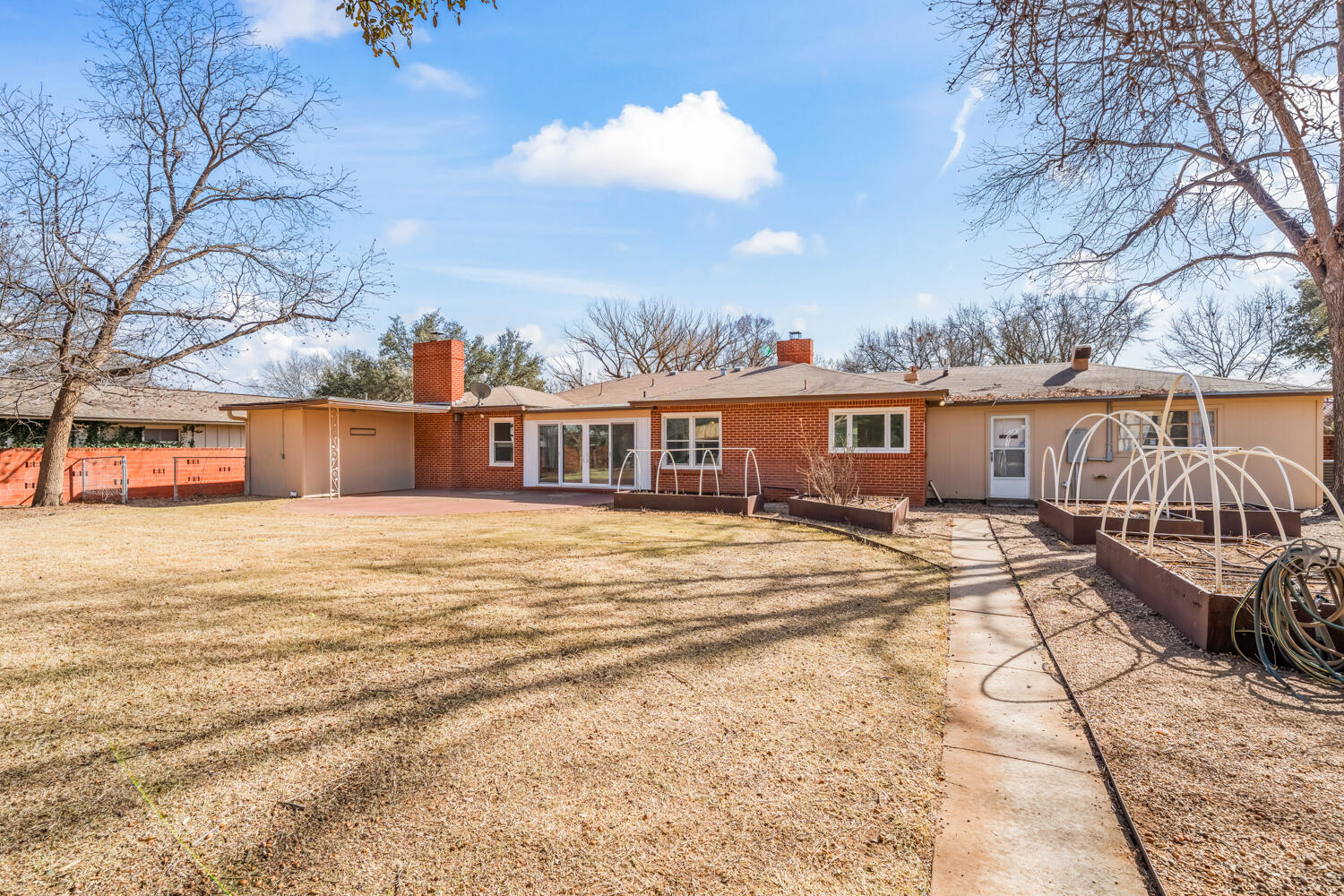 3310 24th Street Lubbock, TX 79410 - Photo 58 of 65 a view of a house with snow on the road