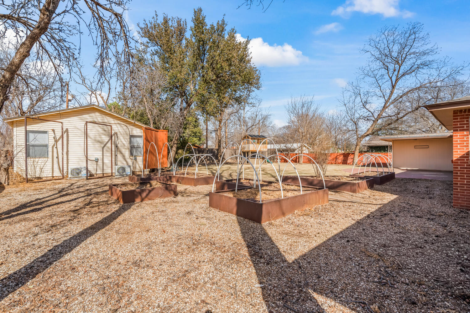 3310 24th Street Lubbock, TX 79410 - Photo 61 of 65 a view of a yard with chairs