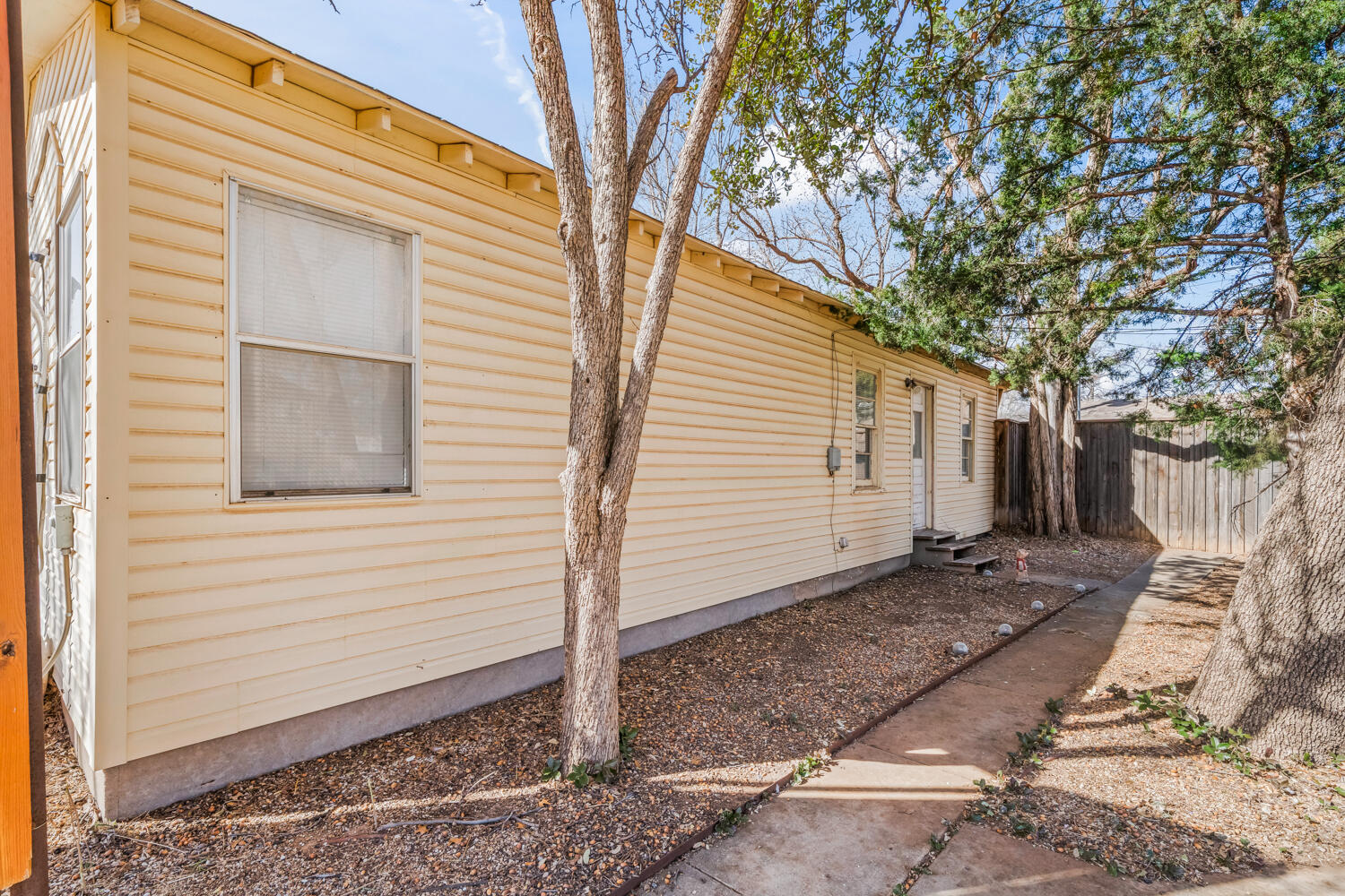 3310 24th Street Lubbock, TX 79410 - Photo 65 of 65 a view of a house with a yard