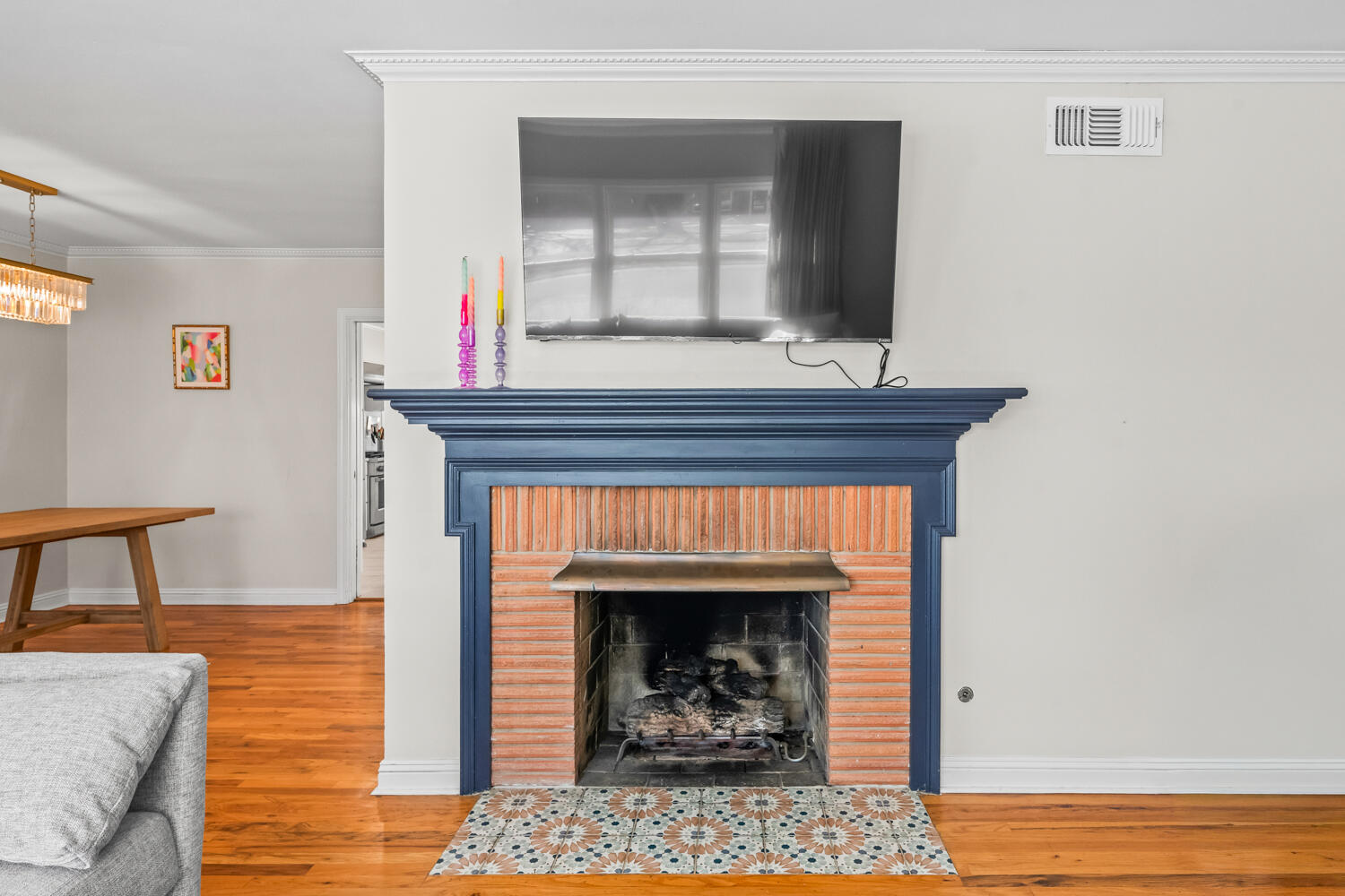 3310 24th Street Lubbock, TX 79410 - Photo 8 of 65 a living room with furniture and a fireplace