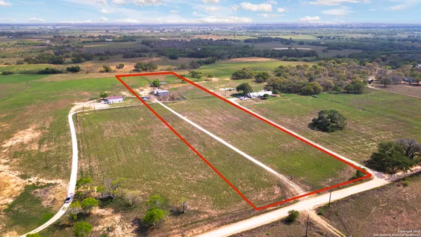 a view of swimming pool with a balcony