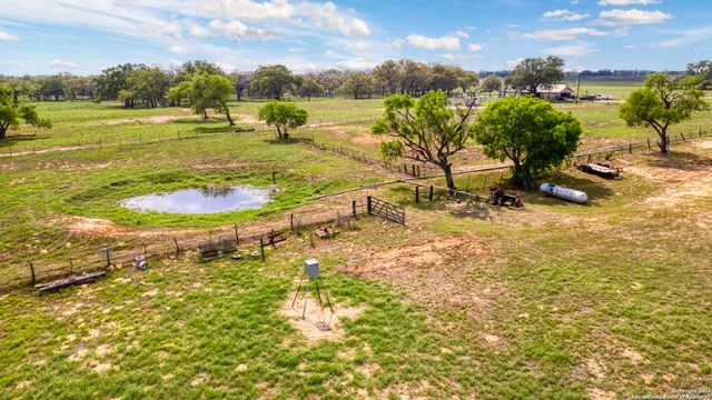 a view of a lake with a yard