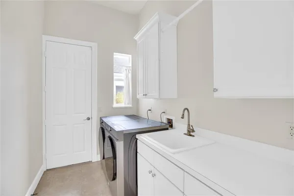 a bathroom with a sink and a vanity