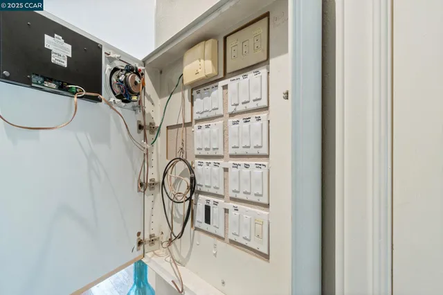 a picture of a room with wooden floor and white walls