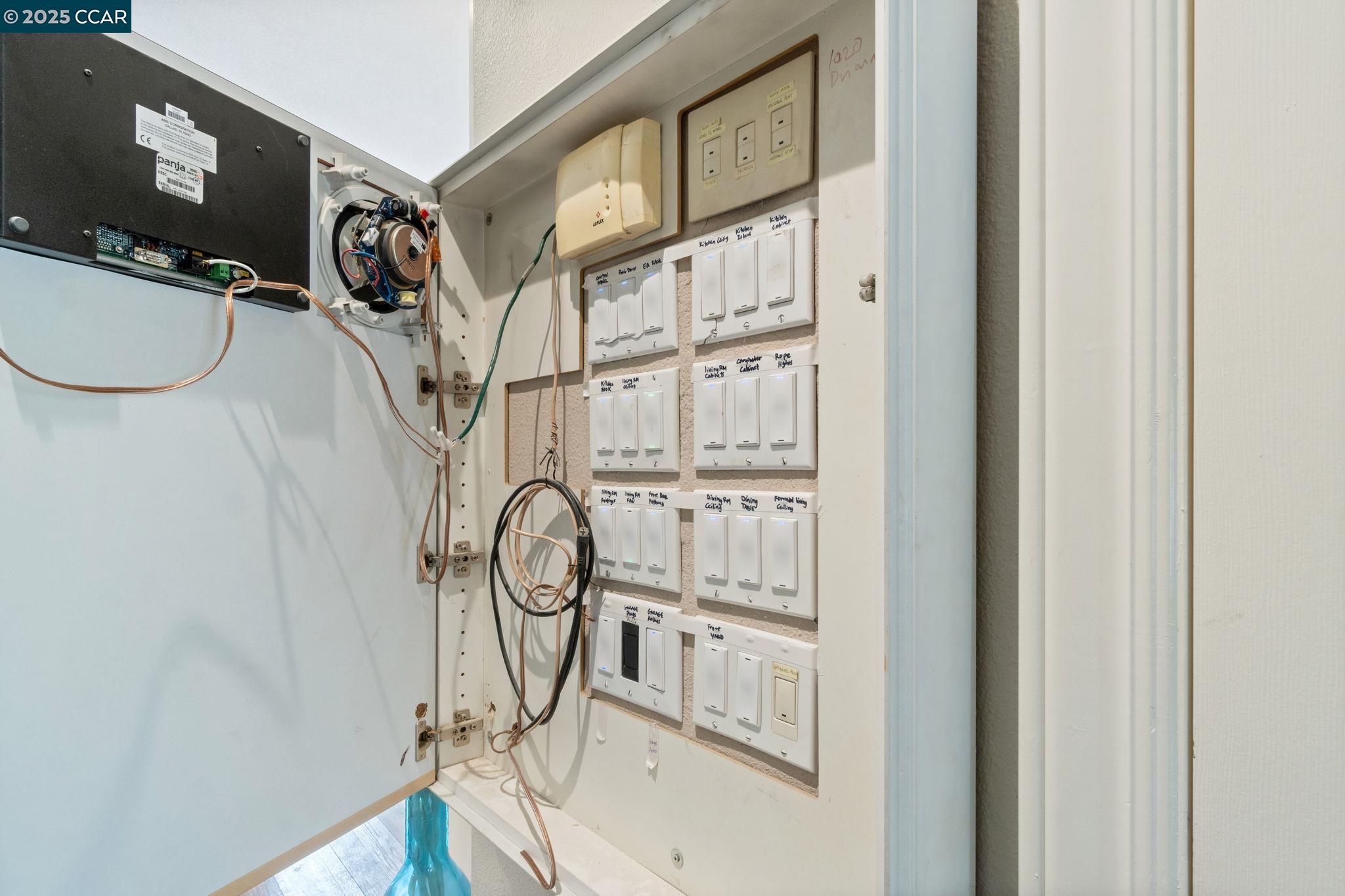 2550 East Jenny Avenue Fresno, CA 93720 - Photo 23 of 49 a picture of a room with wooden floor and white walls