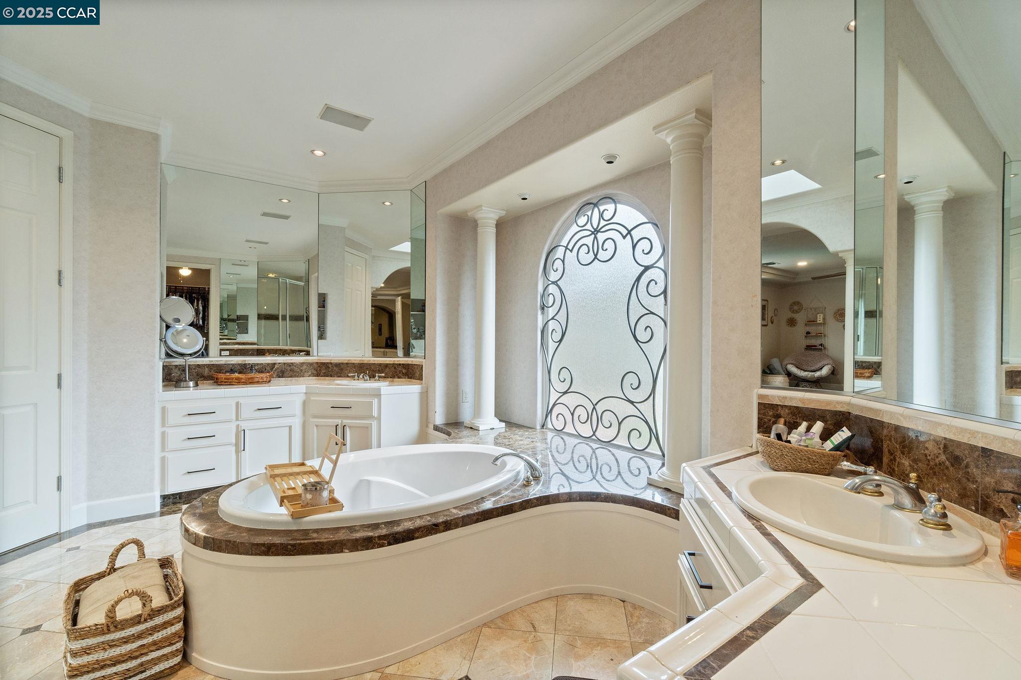 2550 East Jenny Avenue Fresno, CA 93720 - Photo 44 of 49 a bathroom with a bathtub and sink