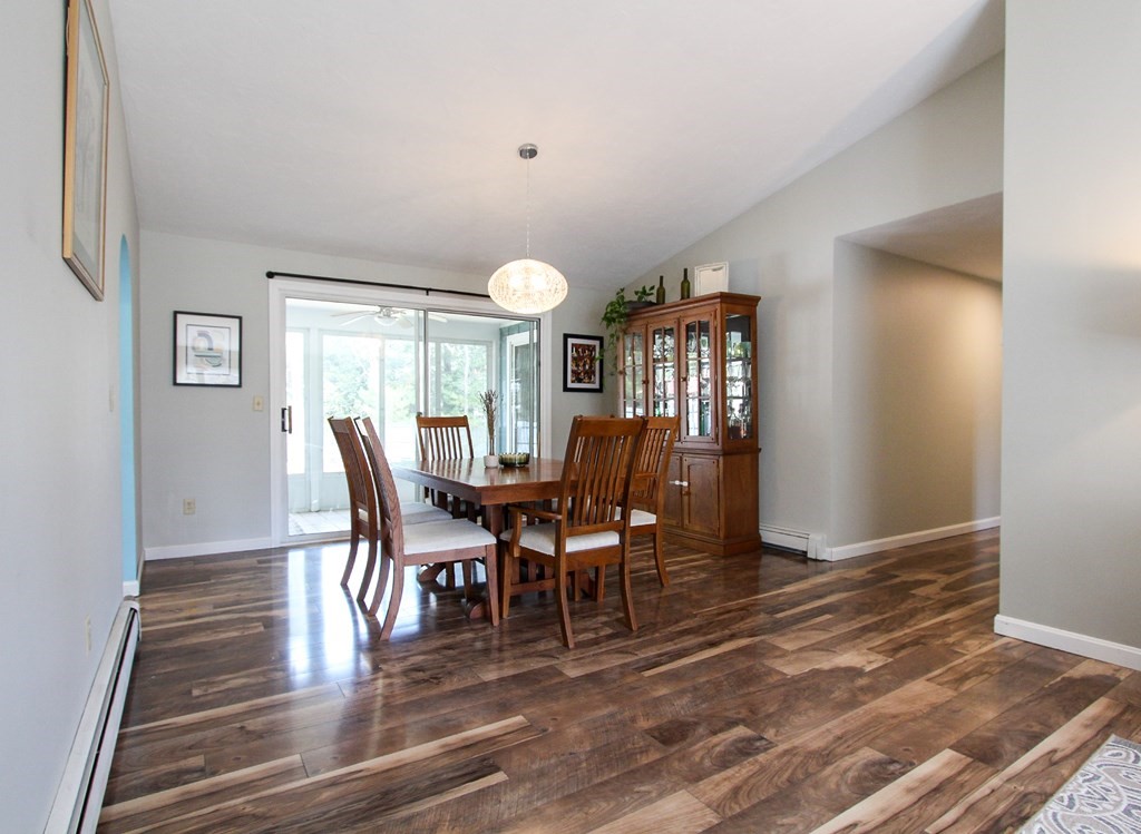 47 Foxglove Road Barnstable, MA 02632 - Photo 13 of 33 a view of a dining room with furniture and wooden floor