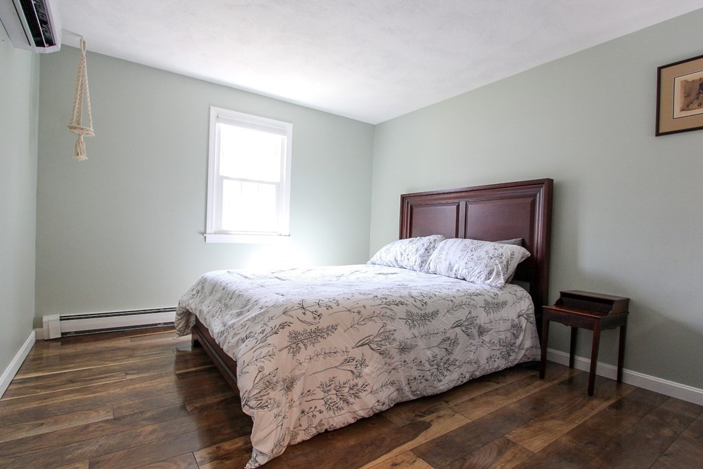 47 Foxglove Road Barnstable, MA 02632 - Photo 17 of 33 a bedroom with a bed and a window