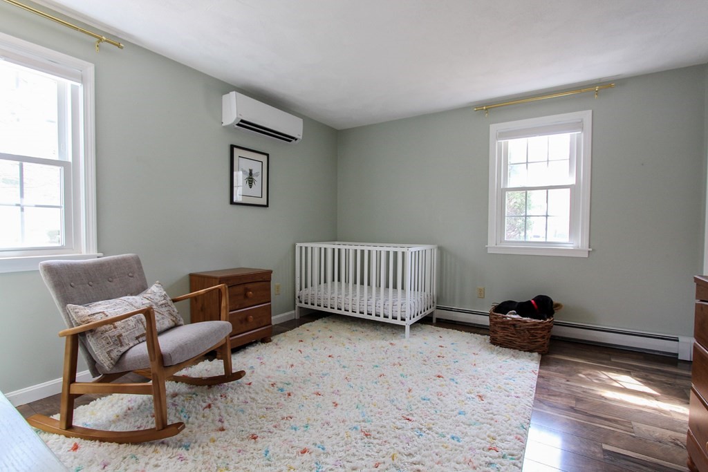 47 Foxglove Road Barnstable, MA 02632 - Photo 18 of 33 a bedroom with furniture and a window