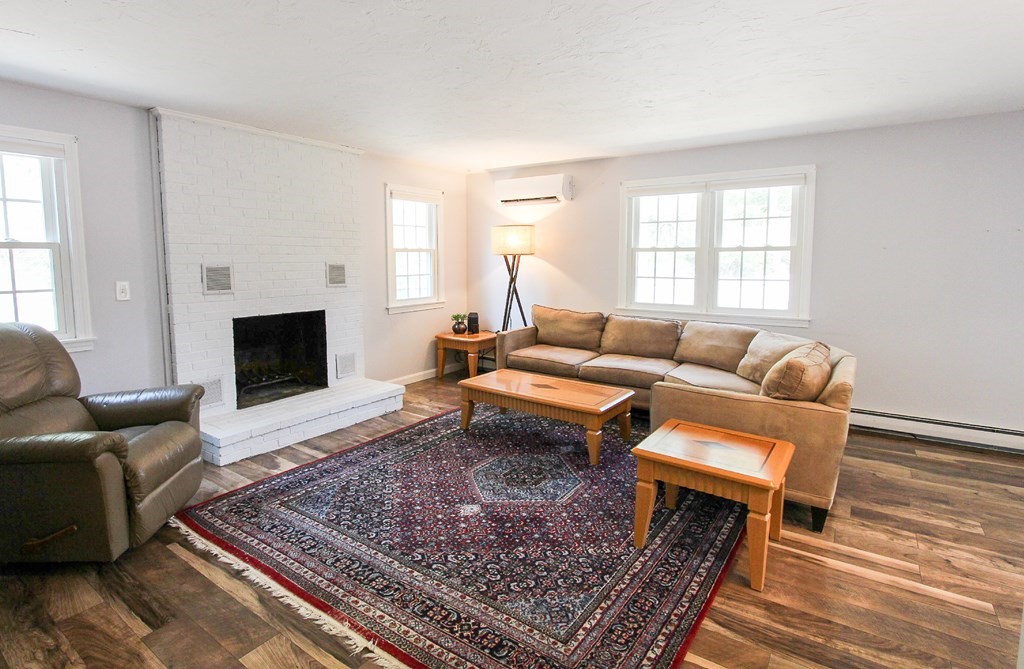 47 Foxglove Road Barnstable, MA 02632 - Photo 2 of 33 a living room with furniture and a rug
