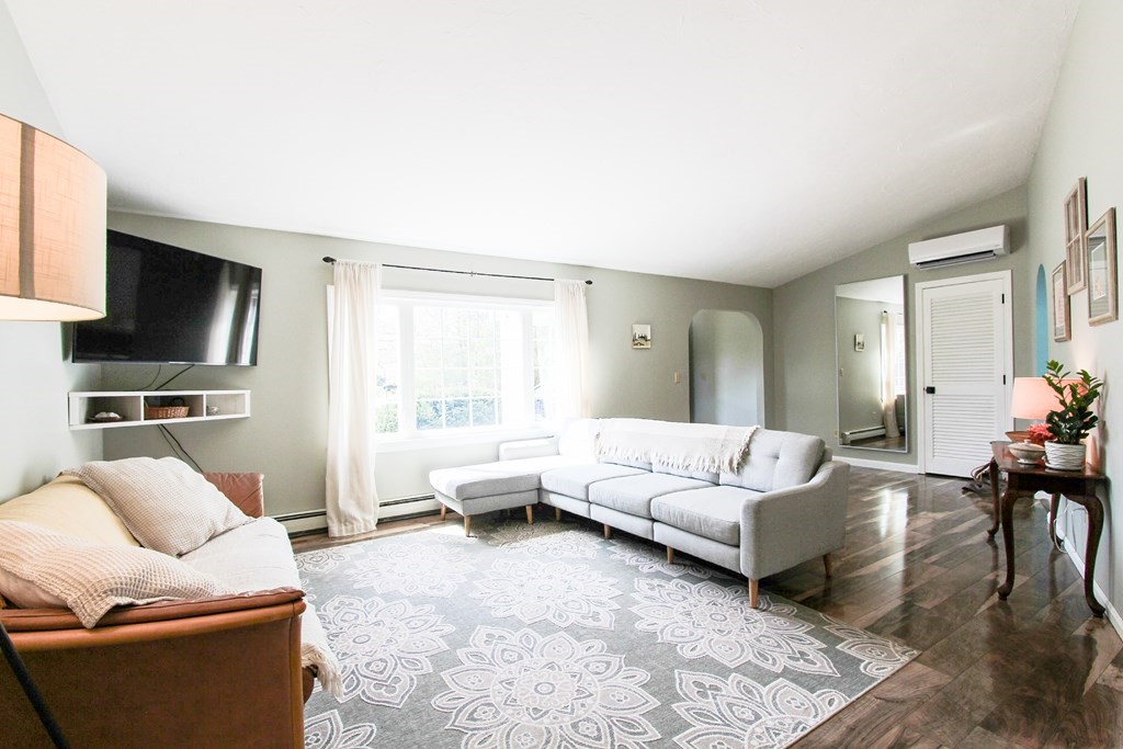 47 Foxglove Road Barnstable, MA 02632 - Photo 9 of 33 a living room with furniture and a flat screen tv