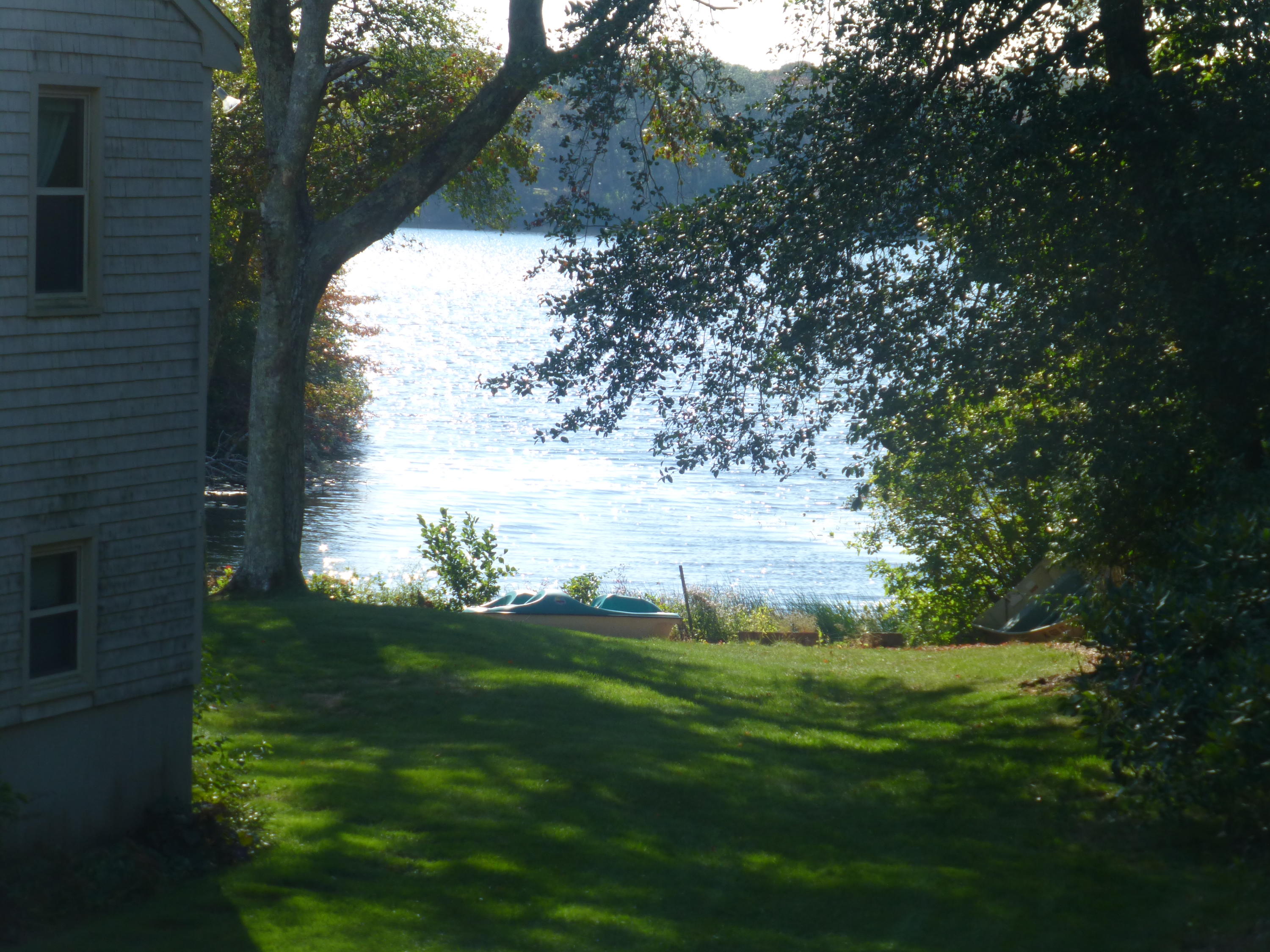 455 Huckins Neck Road Centerville, MA 02632 - Photo 6 of 32 a view of yard with green space