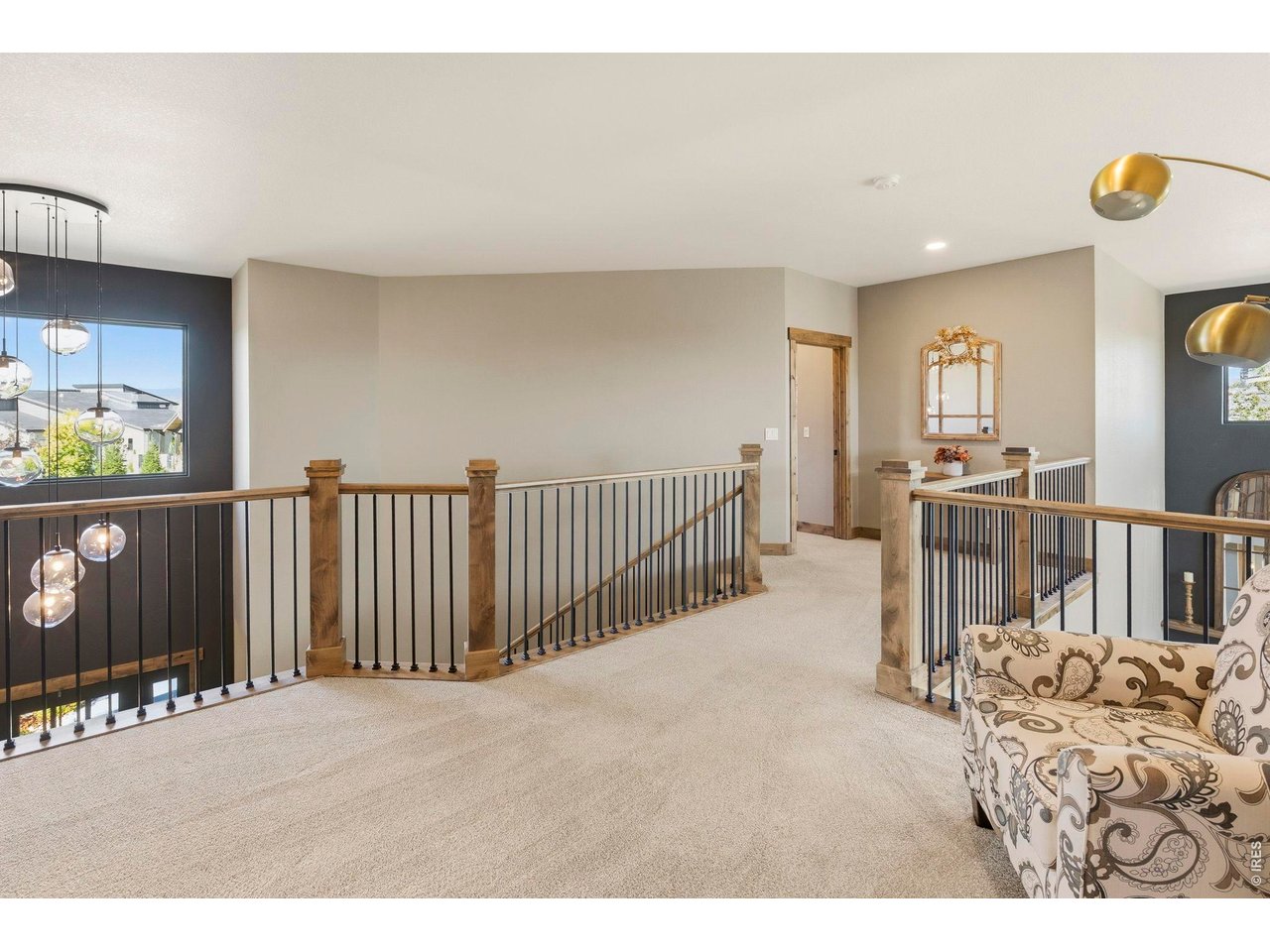 2734 Southwind Road Berthoud, CO 80513 - Photo 30 of 50 Upper Level Loft opens to front entry and Great Room