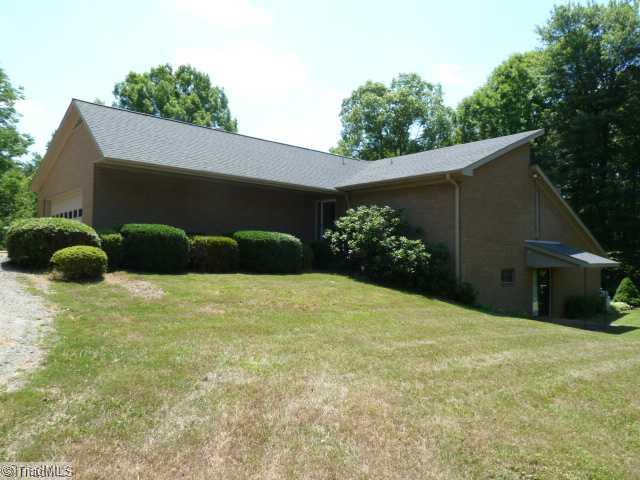 1195 Daisy Trail Road Germanton, NC 27019 - Photo 1 of 16 Exterior Front. All brick one owner home. The driveway could be extended to the door shown here if an "In Law Quaters" was needed.