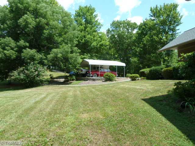 1195 Daisy Trail Road Germanton, NC 27019 - Photo 13 of 16 Parking Lot/Garage. Oversized 2 car attached garage and 2 car detached carport