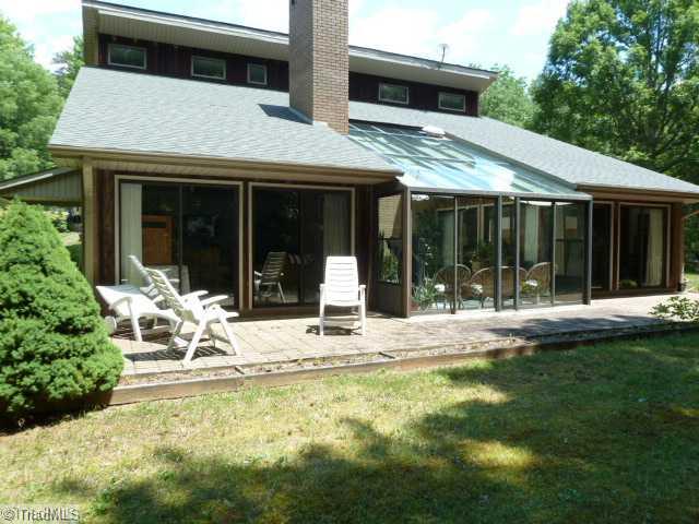 1195 Daisy Trail Road Germanton, NC 27019 - Photo 14 of 16 Patio/Deck. Patio expands the entire back of the house. You can walk out from the den, sunroom or dining room