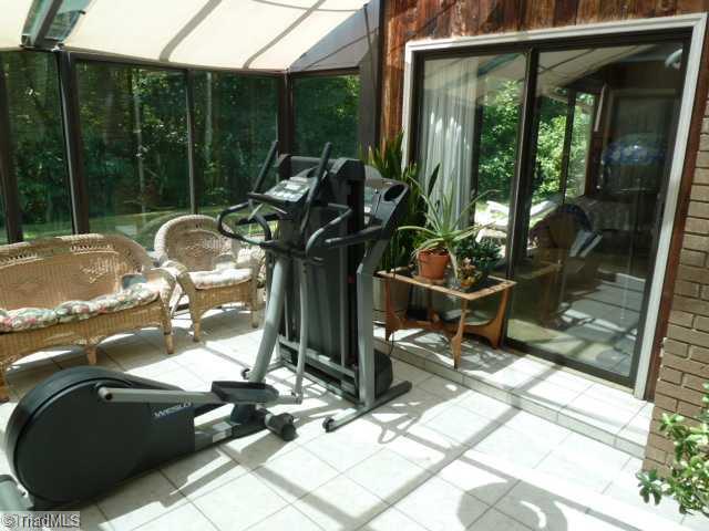 1195 Daisy Trail Road Germanton, NC 27019 - Photo 15 of 16 Sunroom. Sunroom has tiled floor, and is great for those morning workouts!