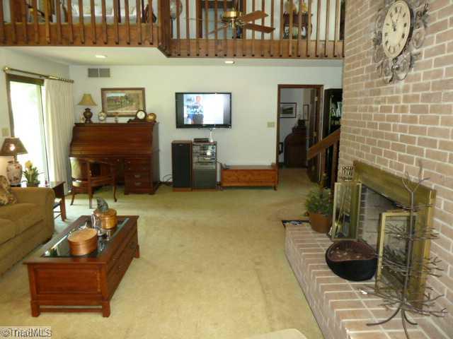 1195 Daisy Trail Road Germanton, NC 27019 - Photo 4 of 16 Den/Family/Great Room. Another view of the den showing the loft area sitting area off one of the bedrooms.