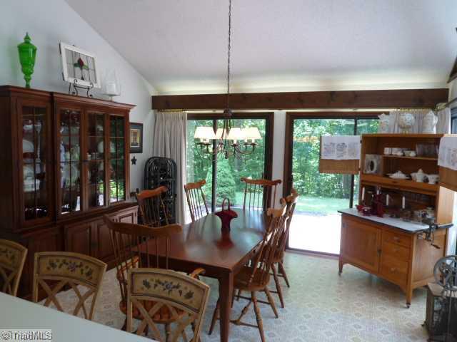 1195 Daisy Trail Road Germanton, NC 27019 - Photo 6 of 16 Dining Room. Spacious dining room has an abundance of light with has sliding doors to patio and sunroom