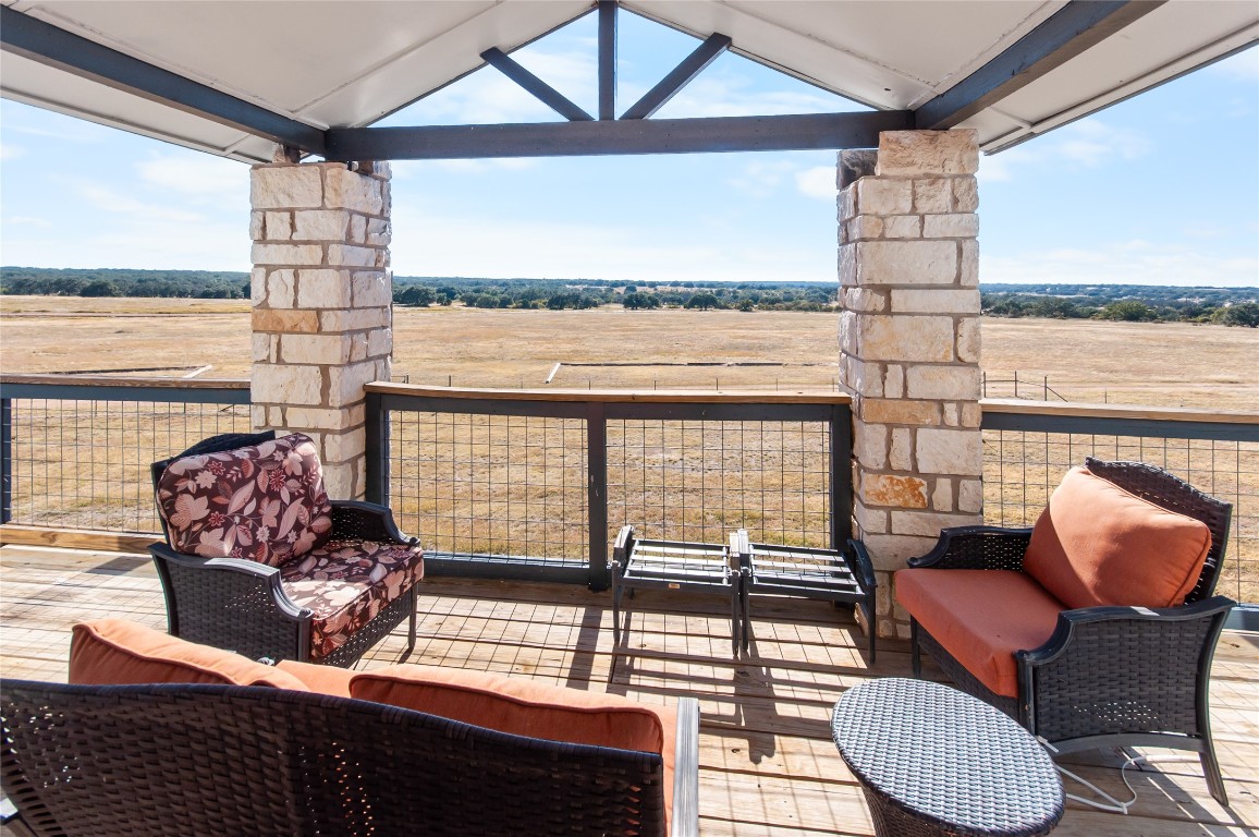 6588 Starks Road Mason, TX 76856 - Photo 26 of 40 a living room with furniture and a floor to ceiling window