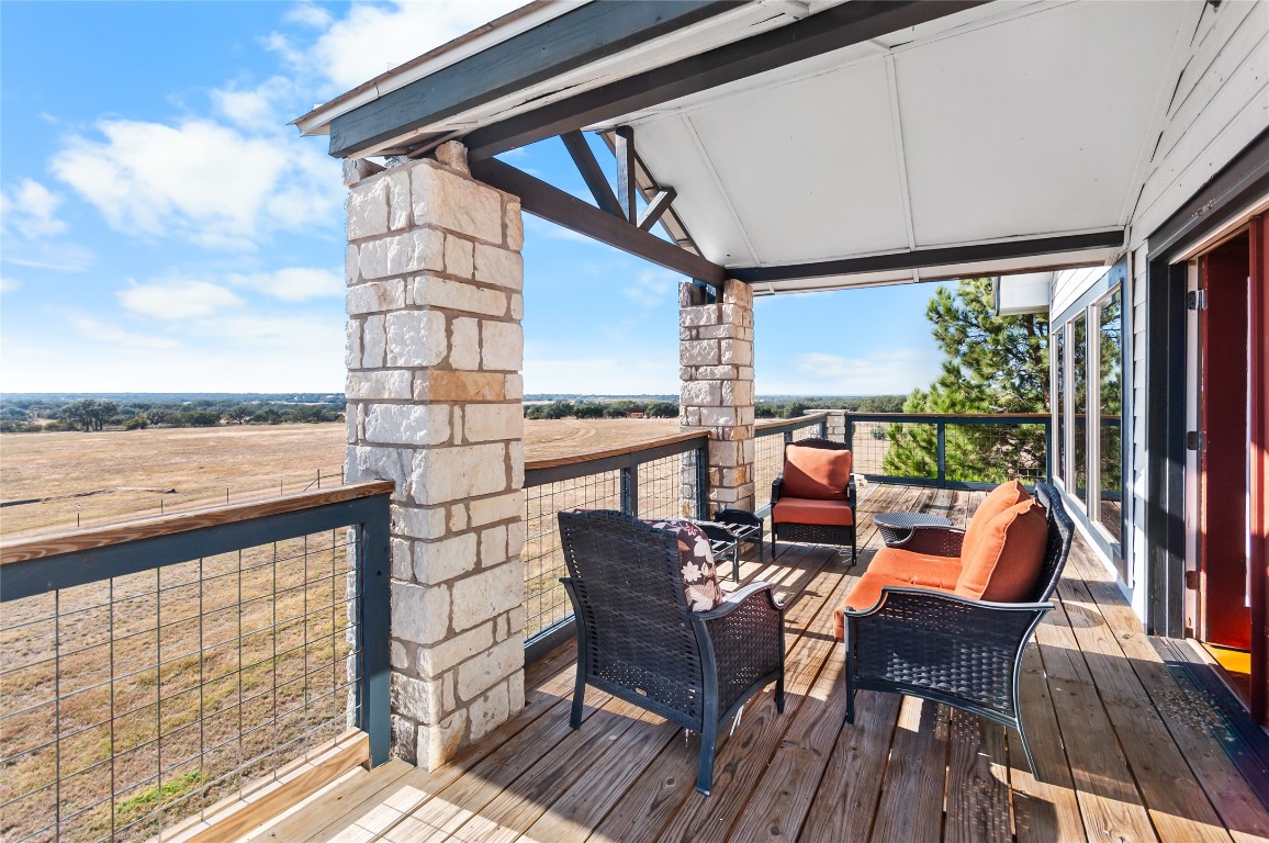 6588 Starks Road Mason, TX 76856 - Photo 7 of 40 a view of a chairs and table in the balcony