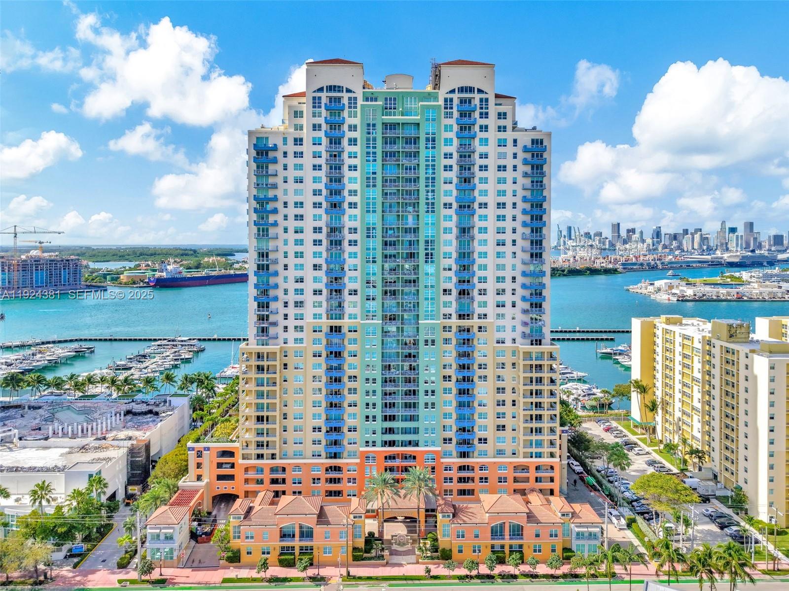 90 Alton Road, Unit 1908 Miami Beach, FL 33139 - Photo 41 of 57 a view of a city with tall buildings