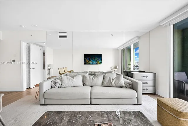 a living room with furniture and a couch