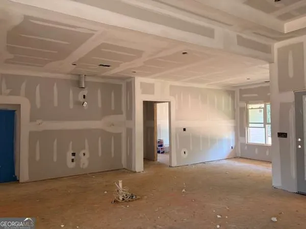 a view of a livingroom with an entryway